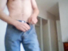 Stripping to jerking a huge cock