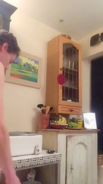 Sucking on a banana