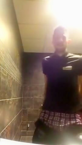 Hung waiter in restroom