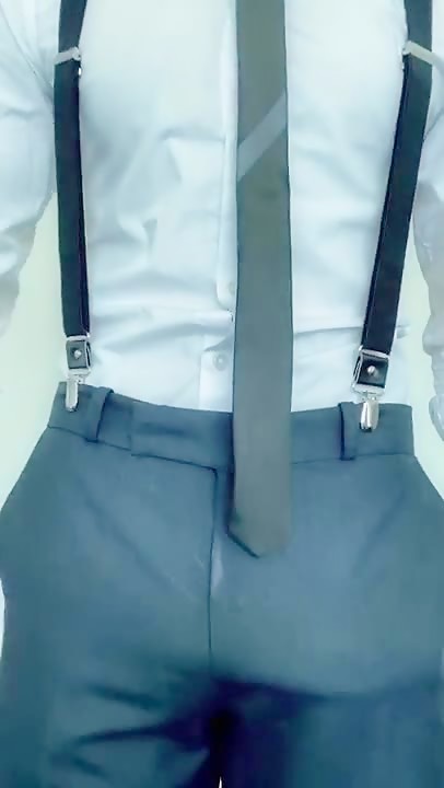 Man in a suit jerks