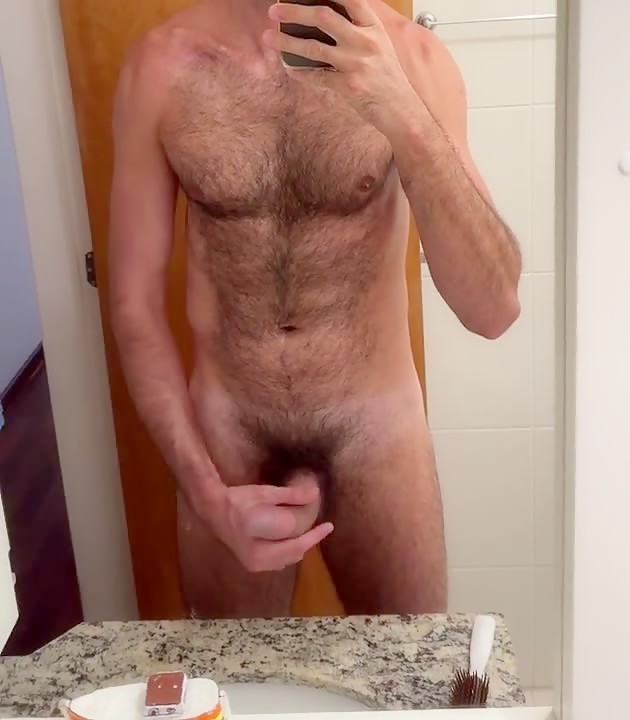 Showing off my hairy body and big cock in the mirror