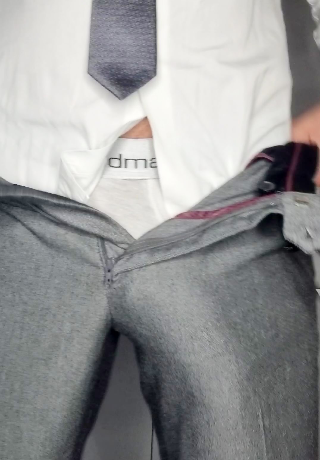 Quick suit bulge exposure of my thick beercan cock